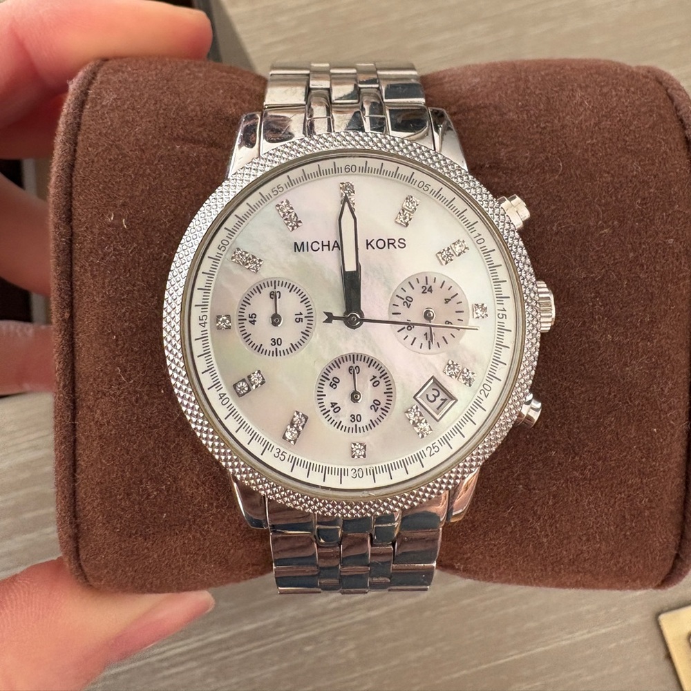 Michael Kors Watch. Silver band, pearl face.